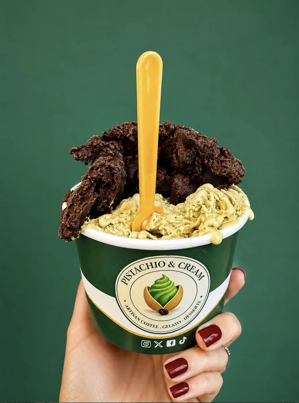 Pistachio gelato with chocolate brownie in a Pistachio & Cream cup