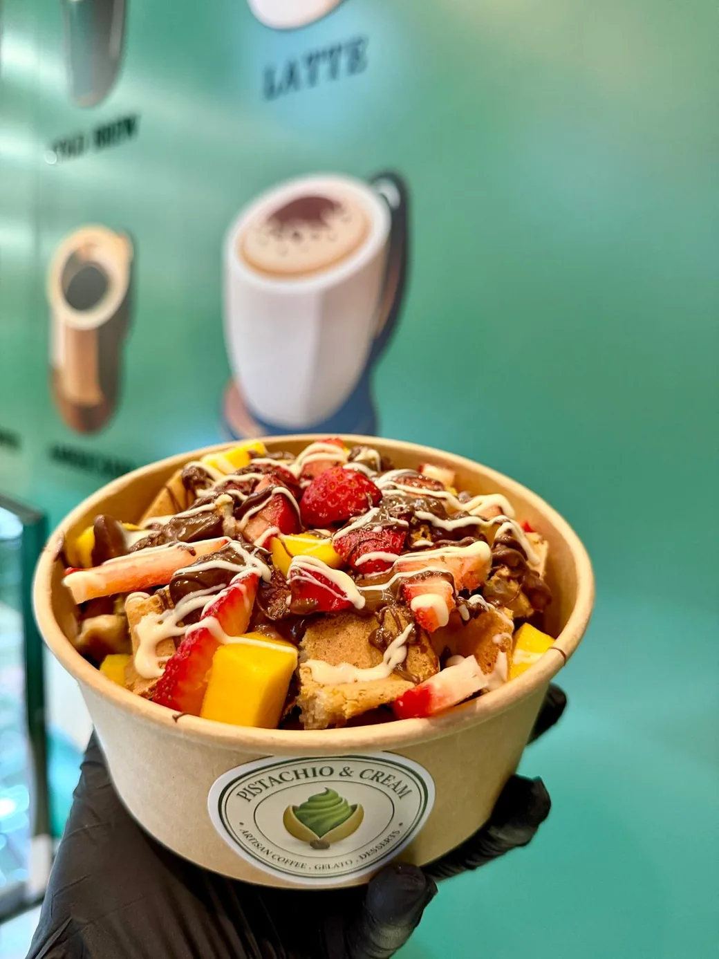 Belgian waffle bowl with fresh fruit and sauces